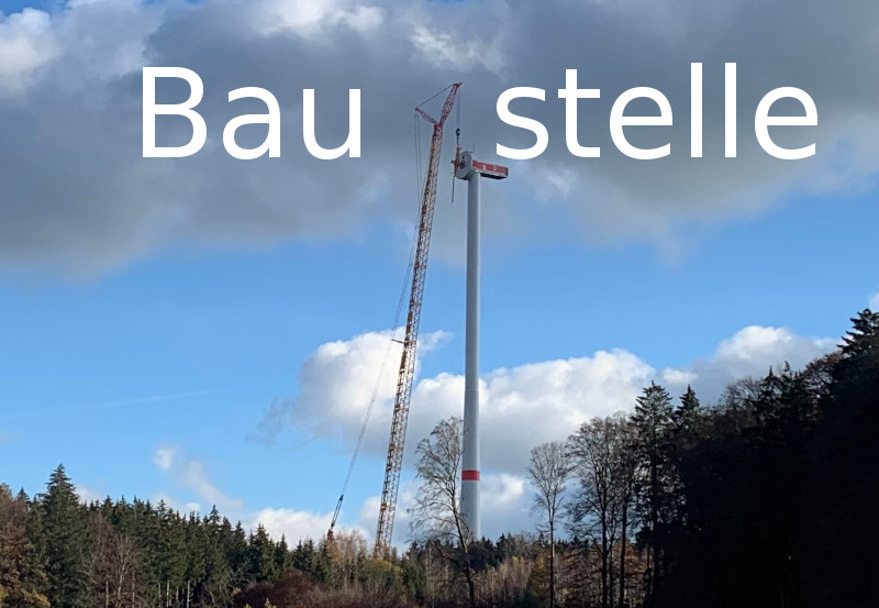 Foto mit Text: Windrad Baustelle